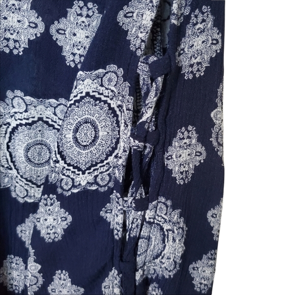 Altar'd State Medallion Faux Wrap Boho Top with Laced Sleeve in Navy. - Picture 4 of 9